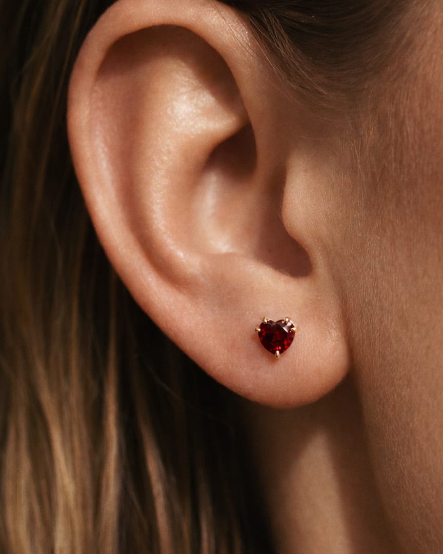 red claw heart yellow gold in lobe red claw heart yellow gold in lobe